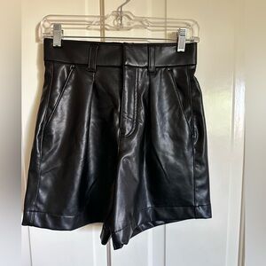 Abercrombie and Fitch women’s vegan leather black pleated shorts.